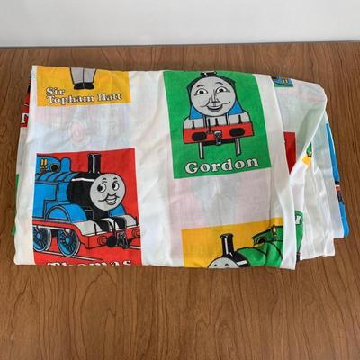 LOT 40 A: Thomas The Tank Engine Collection; Teaching Talking Clock, Happiness Express Portable Lamp, VHS's, DVD, Curtains, Flat...