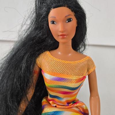 LOT 55B: Variety of Barbies, Ken, 2 Galooob Spice Girls, Britney Spears, and Elvis Dolls