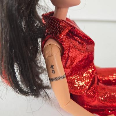 LOT 55B: Variety of Barbies, Ken, 2 Galooob Spice Girls, Britney Spears, and Elvis Dolls