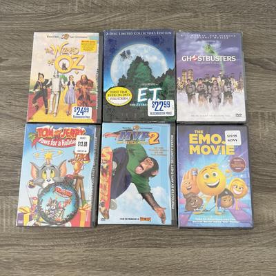 LOT 62B: NIP Kids' / Family DVDs: E.T., Ghostbusters, The Wizard of Oz, The Emoji Movie, Tom and Jerry: Paws for a Holiday & MVP...