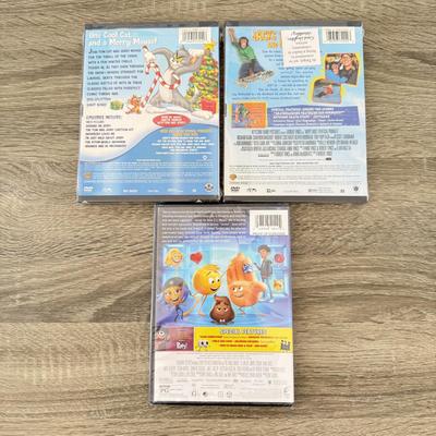 LOT 62B: NIP Kids' / Family DVDs: E.T., Ghostbusters, The Wizard of Oz, The Emoji Movie, Tom and Jerry: Paws for a Holiday & MVP...