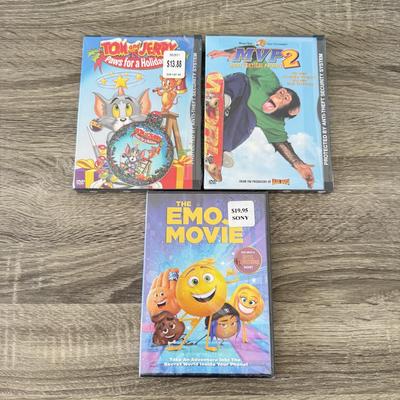 LOT 62B: NIP Kids' / Family DVDs: E.T., Ghostbusters, The Wizard of Oz, The Emoji Movie, Tom and Jerry: Paws for a Holiday & MVP...