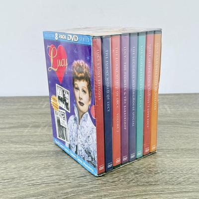 LOT 73B: NIP DVDs: I Love Lucy, Elizabeth Taylor, Golden Girls & Singin' in the Rain