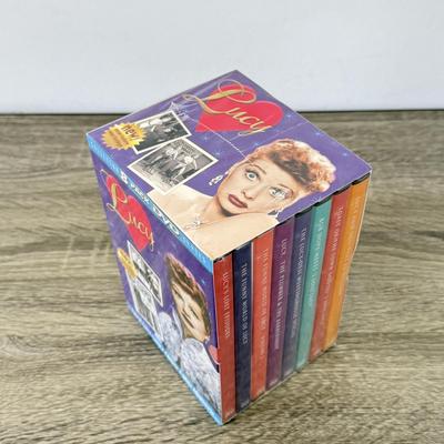 LOT 73B: NIP DVDs: I Love Lucy, Elizabeth Taylor, Golden Girls & Singin' in the Rain