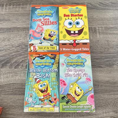 LOT 77B: Spongebob Squarepants Collection: DVDs, VHS Tapes, Zyrofoam NIP, Pencils, 35mm Disposable Camera