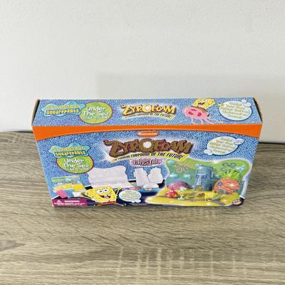 LOT 77B: Spongebob Squarepants Collection: DVDs, VHS Tapes, Zyrofoam NIP, Pencils, 35mm Disposable Camera