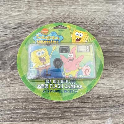 LOT 77B: Spongebob Squarepants Collection: DVDs, VHS Tapes, Zyrofoam NIP, Pencils, 35mm Disposable Camera
