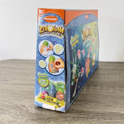 LOT 77B: Spongebob Squarepants Collection: DVDs, VHS Tapes, Zyrofoam NIP, Pencils, 35mm Disposable Camera