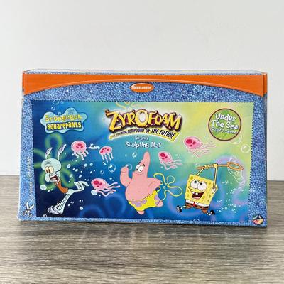 LOT 77B: Spongebob Squarepants Collection: DVDs, VHS Tapes, Zyrofoam NIP, Pencils, 35mm Disposable Camera