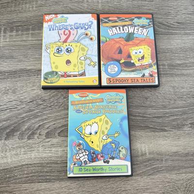 LOT 77B: Spongebob Squarepants Collection: DVDs, VHS Tapes, Zyrofoam NIP, Pencils, 35mm Disposable Camera