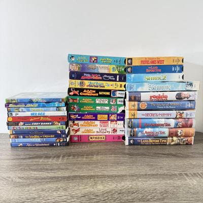 LOT 79A: Kids' DVDs & VHS Tapes: Shrek, Who Framed Roger Rabbit?, Osmosis Jones, Alvin and the Chipmunks, Land Before Time &...