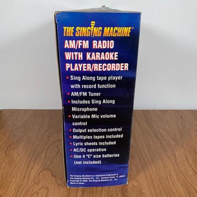 LOT 84 A: NIP The Singing Machine AM/FM Radio With Karaoke Recorder & 2 Teen Hits Cassettes #SMT-423