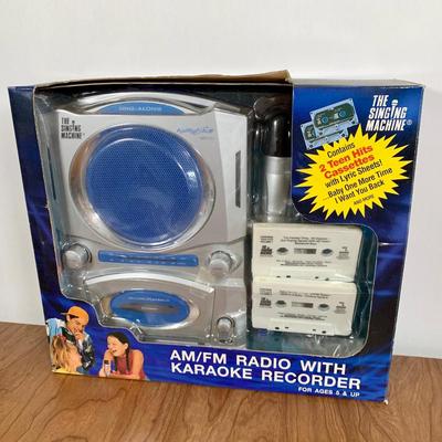 LOT 84 A: NIP The Singing Machine AM/FM Radio With Karaoke Recorder & 2 Teen Hits Cassettes #SMT-423