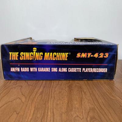 LOT 84 A: NIP The Singing Machine AM/FM Radio With Karaoke Recorder & 2 Teen Hits Cassettes #SMT-423