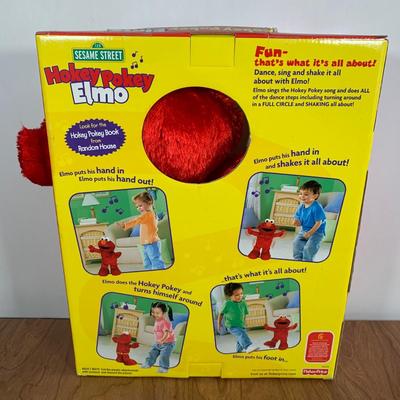 LOT 85 A: Sesame Street Elmo Collection; 2008 Fisher-Price Elmo Live! & 2002 Hokey Pokey Elmo, Limited Edition 25th Anniversary...
