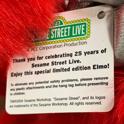 LOT 85 A: Sesame Street Elmo Collection; 2008 Fisher-Price Elmo Live! & 2002 Hokey Pokey Elmo, Limited Edition 25th Anniversary...