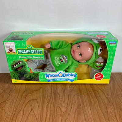 LOT 92 A: 2006 NIP Playmates Water Babies Collection; Sesame Street Oscar The Grouch, Disney Eeyore, & Nickelodeon SpongeBob SquarePants