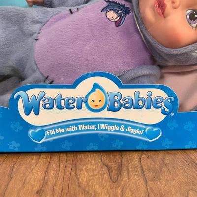 LOT 92 A: 2006 NIP Playmates Water Babies Collection; Sesame Street Oscar The Grouch, Disney Eeyore, & Nickelodeon SpongeBob SquarePants