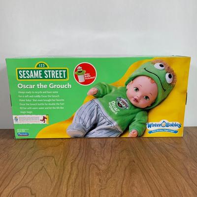 LOT 92 A: 2006 NIP Playmates Water Babies Collection; Sesame Street Oscar The Grouch, Disney Eeyore, & Nickelodeon SpongeBob SquarePants