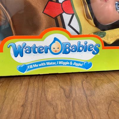 LOT 92 A: 2006 NIP Playmates Water Babies Collection; Sesame Street Oscar The Grouch, Disney Eeyore, & Nickelodeon SpongeBob SquarePants