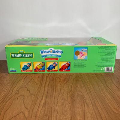 LOT 92 A: 2006 NIP Playmates Water Babies Collection; Sesame Street Oscar The Grouch, Disney Eeyore, & Nickelodeon SpongeBob SquarePants