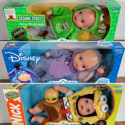 LOT 92 A: 2006 NIP Playmates Water Babies Collection; Sesame Street Oscar The Grouch, Disney Eeyore, & Nickelodeon SpongeBob SquarePants