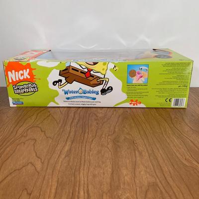 LOT 92 A: 2006 NIP Playmates Water Babies Collection; Sesame Street Oscar The Grouch, Disney Eeyore, & Nickelodeon SpongeBob SquarePants