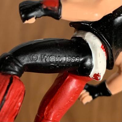 LOT 99 A: 1998 Toy Biz Co. WCW Miniature Metal Figurines