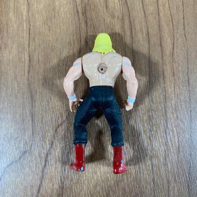 LOT 99 A: 1998 Toy Biz Co. WCW Miniature Metal Figurines