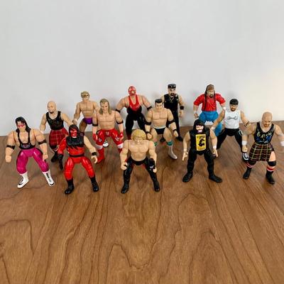 LOT 100 A: 1998 NWO WCW C-Pen, 1999 Collectible Playing Cards, & Miniature Figurines