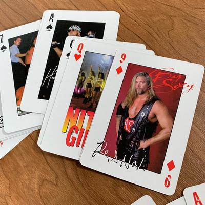 LOT 100 A: 1998 NWO WCW C-Pen, 1999 Collectible Playing Cards, & Miniature Figurines