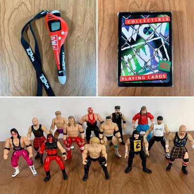 LOT 100 A: 1998 NWO WCW C-Pen, 1999 Collectible Playing Cards, & Miniature Figurines