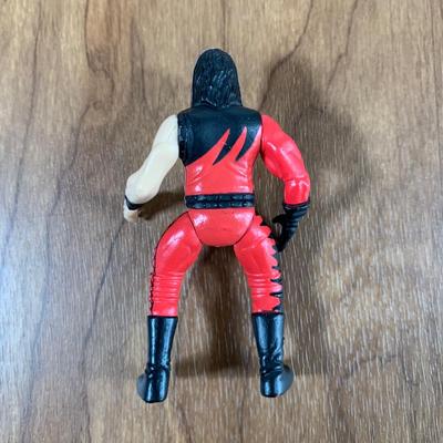 LOT 100 A: 1998 NWO WCW C-Pen, 1999 Collectible Playing Cards, & Miniature Figurines