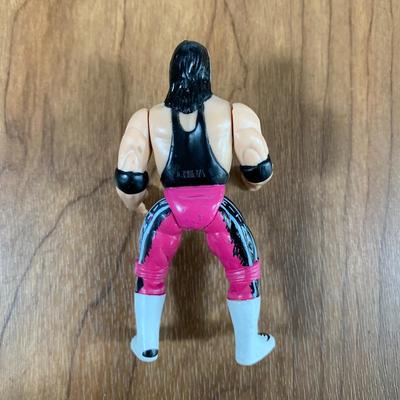 LOT 100 A: 1998 NWO WCW C-Pen, 1999 Collectible Playing Cards, & Miniature Figurines