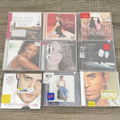 LOT 107A: NIP CDs: Cher, Britney Spears, Justin Timberlake, Enrique Iglesias, Michael Jackson, Gwen Stefani & More