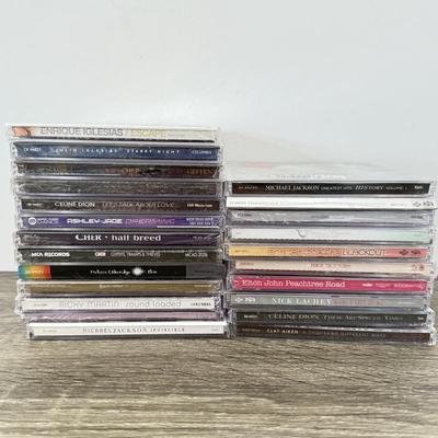 LOT 107A: NIP CDs: Cher, Britney Spears, Justin Timberlake, Enrique Iglesias, Michael Jackson, Gwen Stefani & More