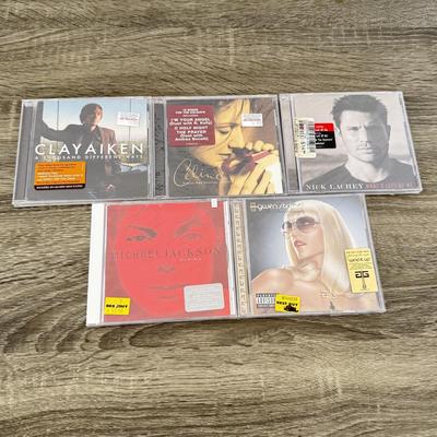 LOT 107A: NIP CDs: Cher, Britney Spears, Justin Timberlake, Enrique Iglesias, Michael Jackson, Gwen Stefani & More