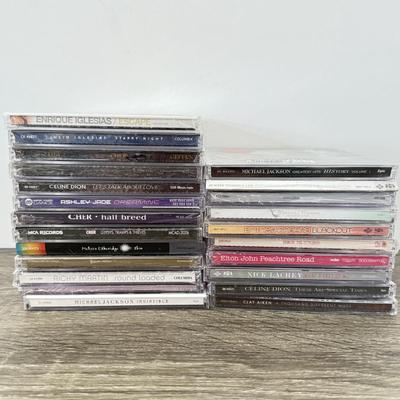 LOT 107A: NIP CDs: Cher, Britney Spears, Justin Timberlake, Enrique Iglesias, Michael Jackson, Gwen Stefani & More