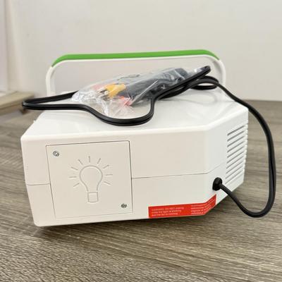 LOT 117L: Sharper Image Portable Entertainment Projector Model 1007589