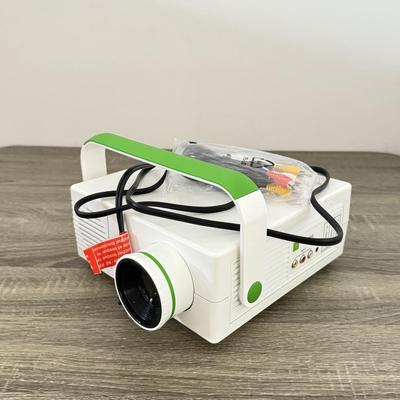 LOT 117L: Sharper Image Portable Entertainment Projector Model 1007589