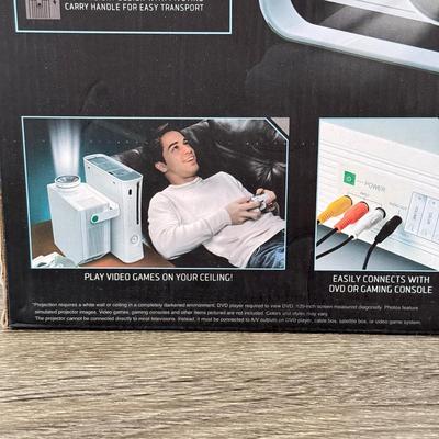 LOT 117L: Sharper Image Portable Entertainment Projector Model 1007589