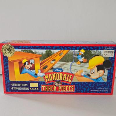LOT 122A: Walt Disney World Monorail Pieces & 4 Disney Figures