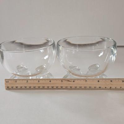 LOT 124B: Mickey Mouse Head Shaped Cutting Board, Metal Trivet, Bowls with Mickey's Feet, Minnie Mouse Cup and Saucer, and Minnie...