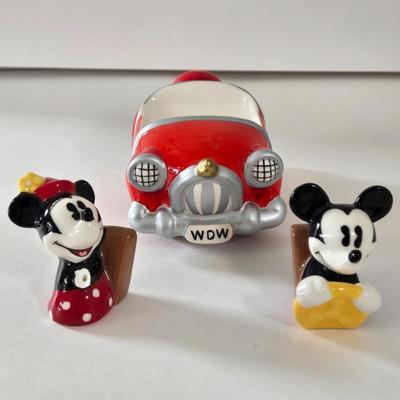 LOT 124B: Mickey Mouse Head Shaped Cutting Board, Metal Trivet, Bowls with Mickey's Feet, Minnie Mouse Cup and Saucer, and Minnie...