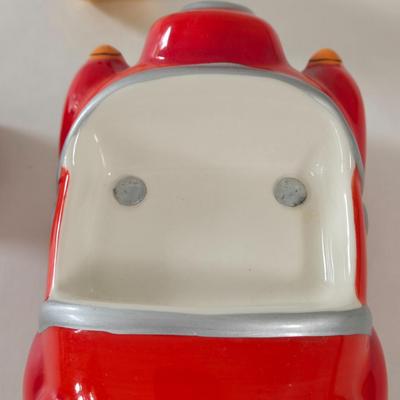 LOT 124B: Mickey Mouse Head Shaped Cutting Board, Metal Trivet, Bowls with Mickey's Feet, Minnie Mouse Cup and Saucer, and Minnie...