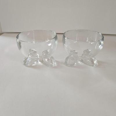 LOT 124B: Mickey Mouse Head Shaped Cutting Board, Metal Trivet, Bowls with Mickey's Feet, Minnie Mouse Cup and Saucer, and Minnie...