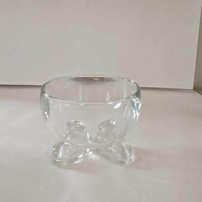 LOT 124B: Mickey Mouse Head Shaped Cutting Board, Metal Trivet, Bowls with Mickey's Feet, Minnie Mouse Cup and Saucer, and Minnie...