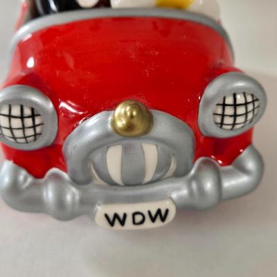 LOT 124B: Mickey Mouse Head Shaped Cutting Board, Metal Trivet, Bowls with Mickey's Feet, Minnie Mouse Cup and Saucer, and Minnie...