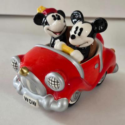 LOT 124B: Mickey Mouse Head Shaped Cutting Board, Metal Trivet, Bowls with Mickey's Feet, Minnie Mouse Cup and Saucer, and Minnie...