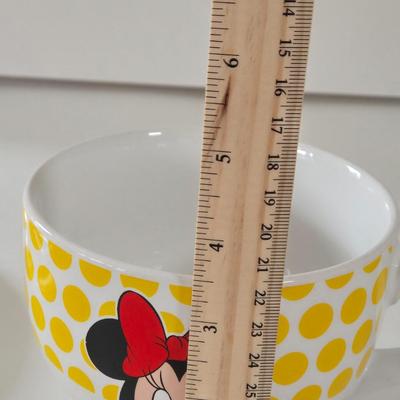 LOT 124B: Mickey Mouse Head Shaped Cutting Board, Metal Trivet, Bowls with Mickey's Feet, Minnie Mouse Cup and Saucer, and Minnie...